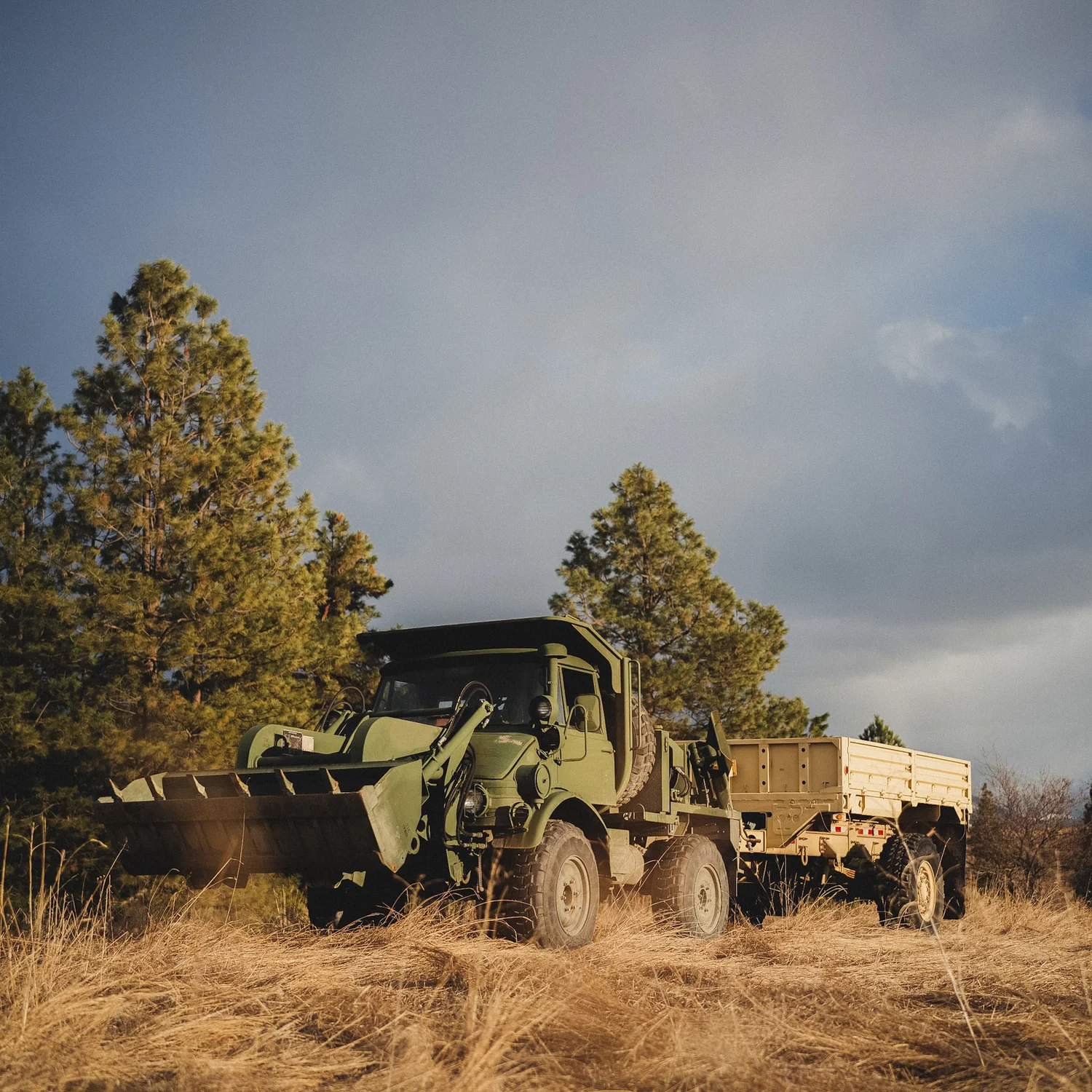 A rugged Mater truck in a sunlit field